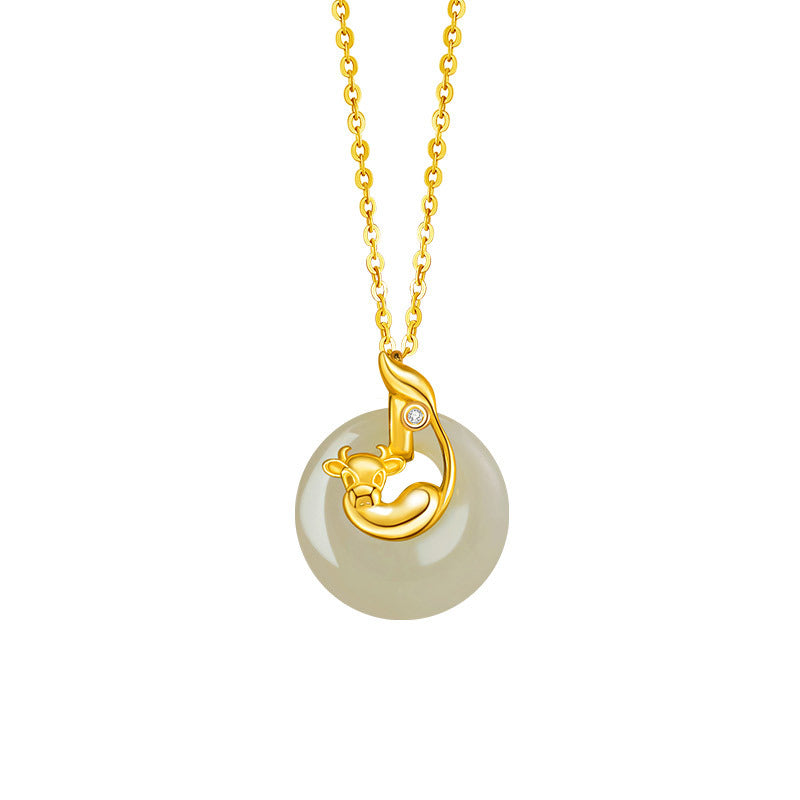 Birthright ox zodiac pendant necklace made of Hetian jade and gold with a diamond accent.
