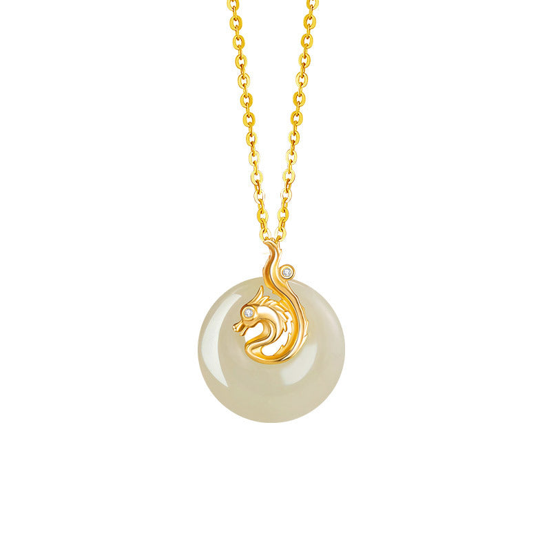 A gold pendant necklace featuring a round, pale green Hetian jade disc with a golden dragon accent and two small diamonds.