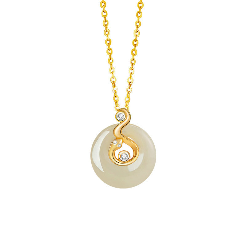 Birthright Hetian Jade Zodiac Pendant Necklace featuring a circular pale jade stone with a swirling gold accent adorned with diamonds.