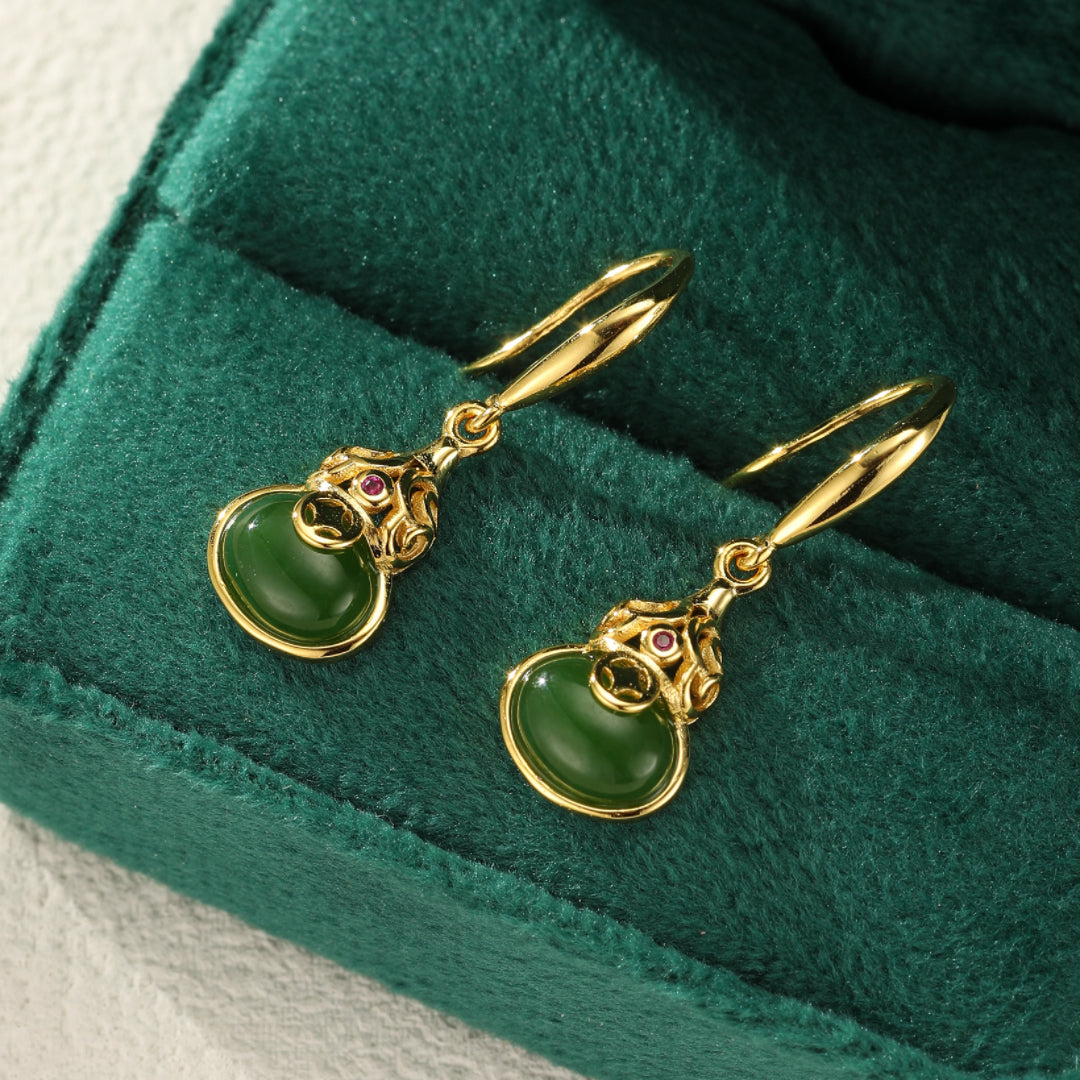 Brimful green jade gourd drop earrings with ruby accents and gold plating