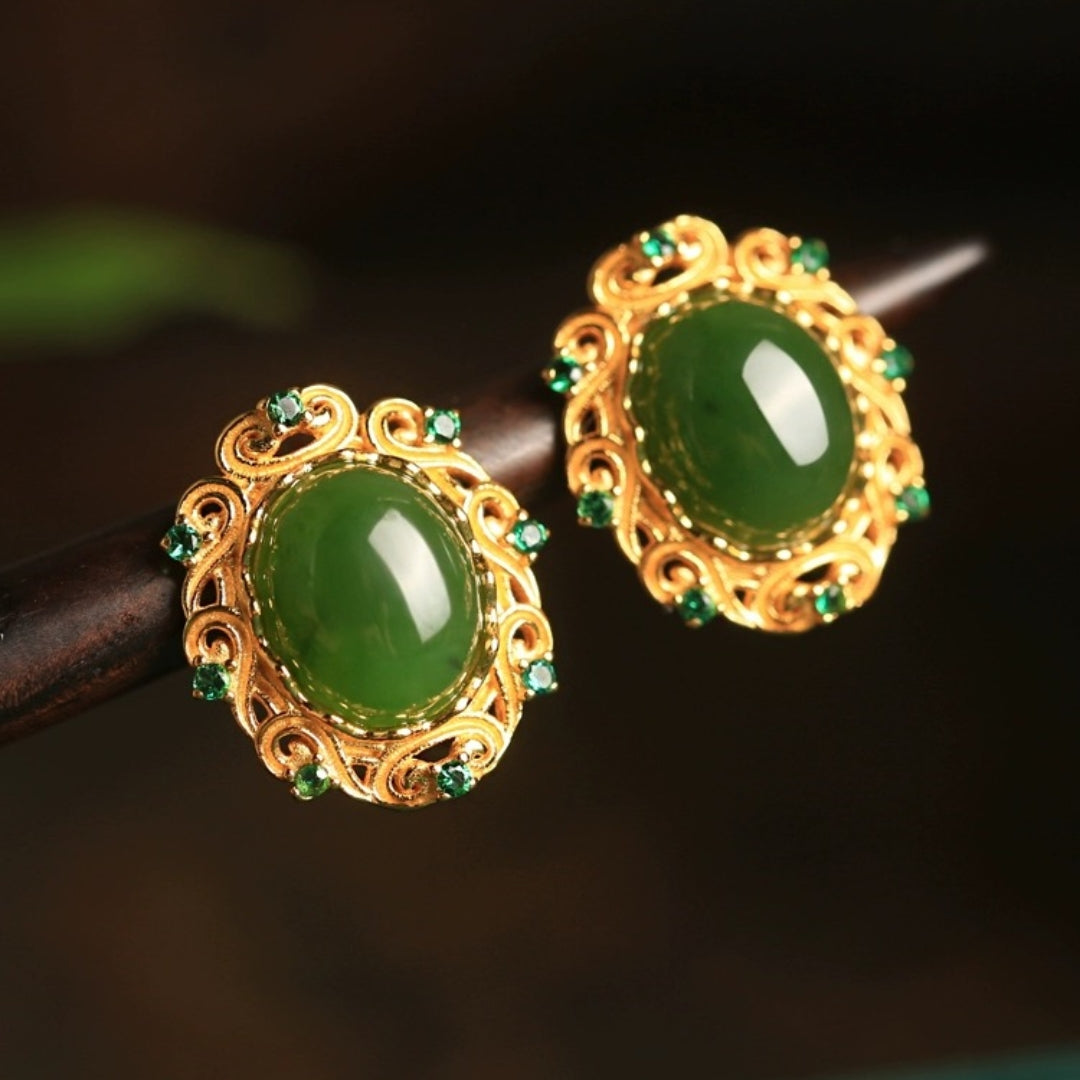 Charmed — Green Jade Cloud Stud Earrings with gold plating and small green accent stones.