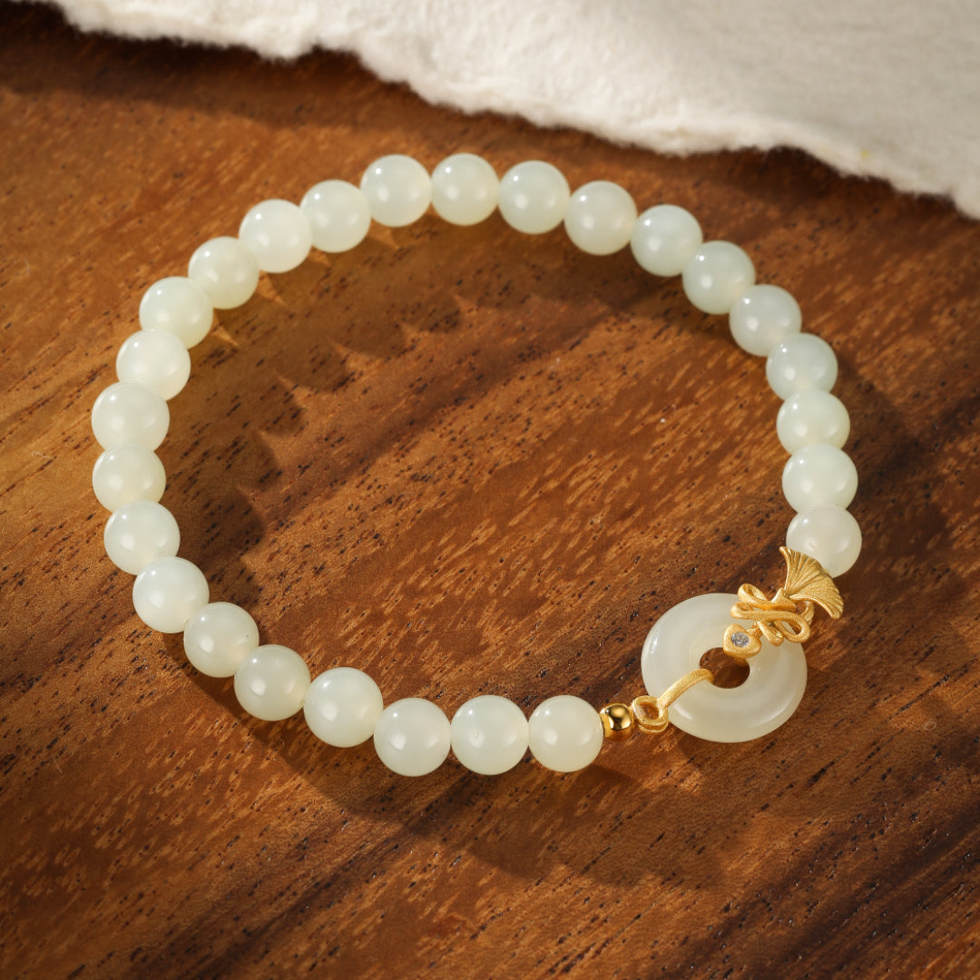 Charmed Life Hetian Jade Bi Disc Beaded Bracelet with gold plated silver clasp