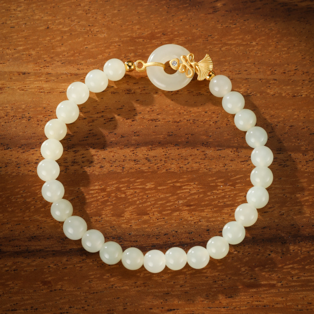 Charmed Life Hetian Jade Bi Disc Beaded Bracelet with gold clasp and diamond accent