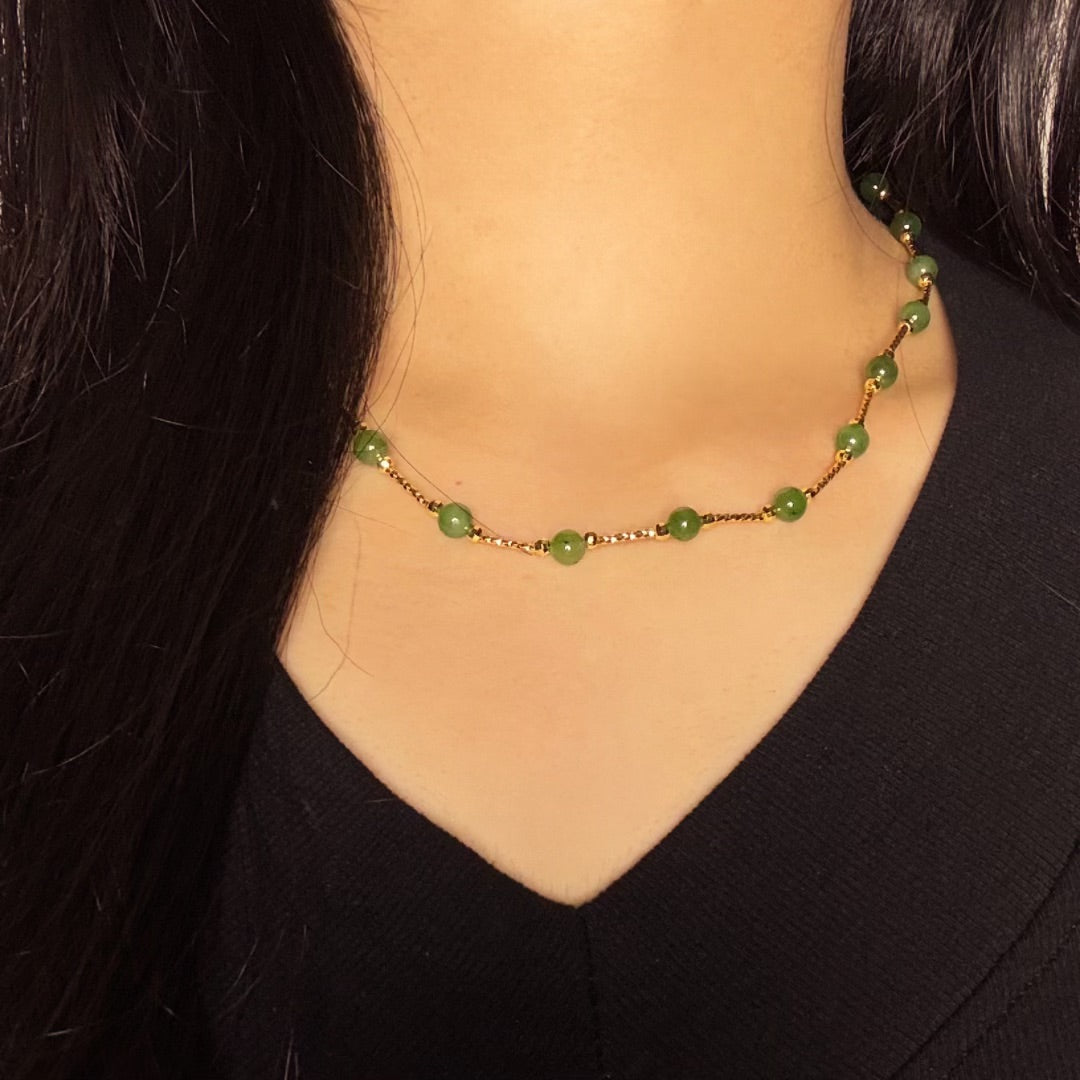Heyday Green Jade Beaded Necklace with gold chain worn by a woman