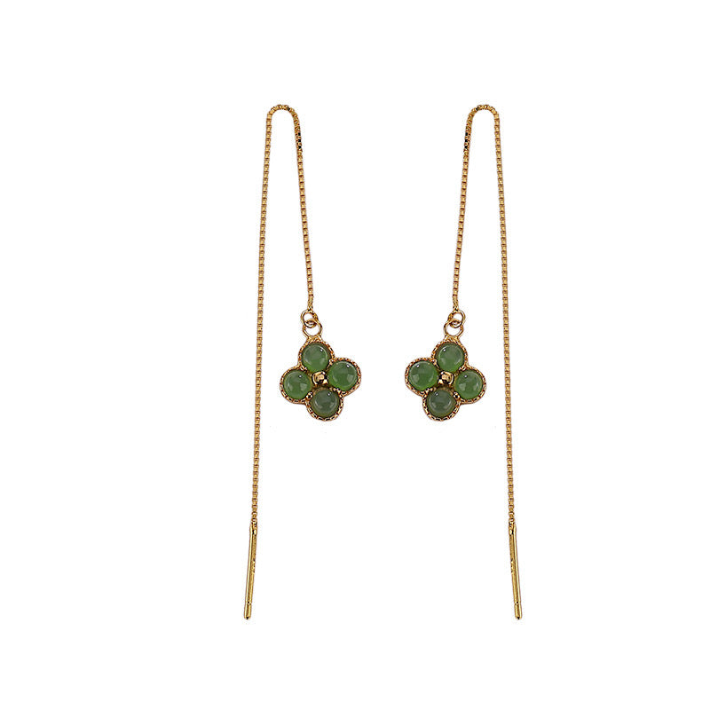 Green jade clover drop earrings with gold plated chains.