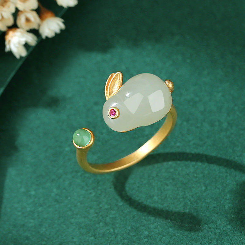 Moonglow Hetian Jade Rabbit Ring with gold-plated details and a small green jade accent.