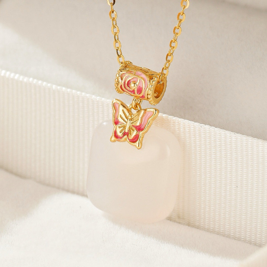 Second Act Mutton Fat Jade Butterfly Pendant Necklace with gold chain and pink enamel details