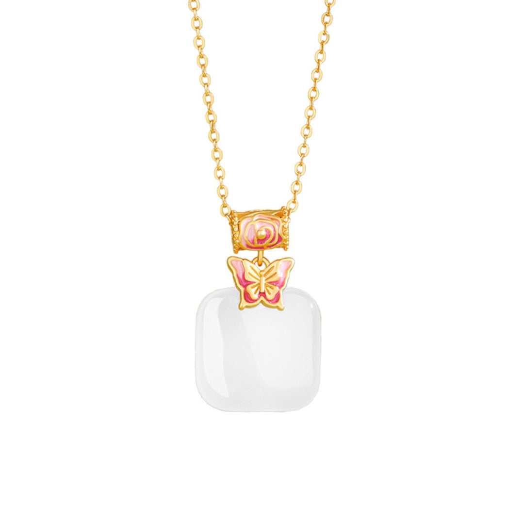 Second Act Mutton Fat Jade Butterfly Pendant Necklace with gold chain and pink enamel butterfly detail