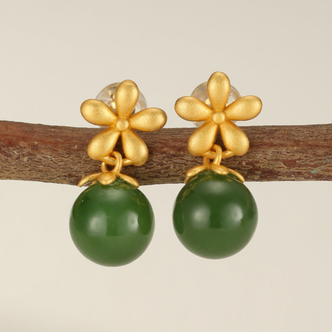 Sweet Nothings Hetian Jade Flower Drop Earrings with gold-plated flower tops and deep green jade beads.