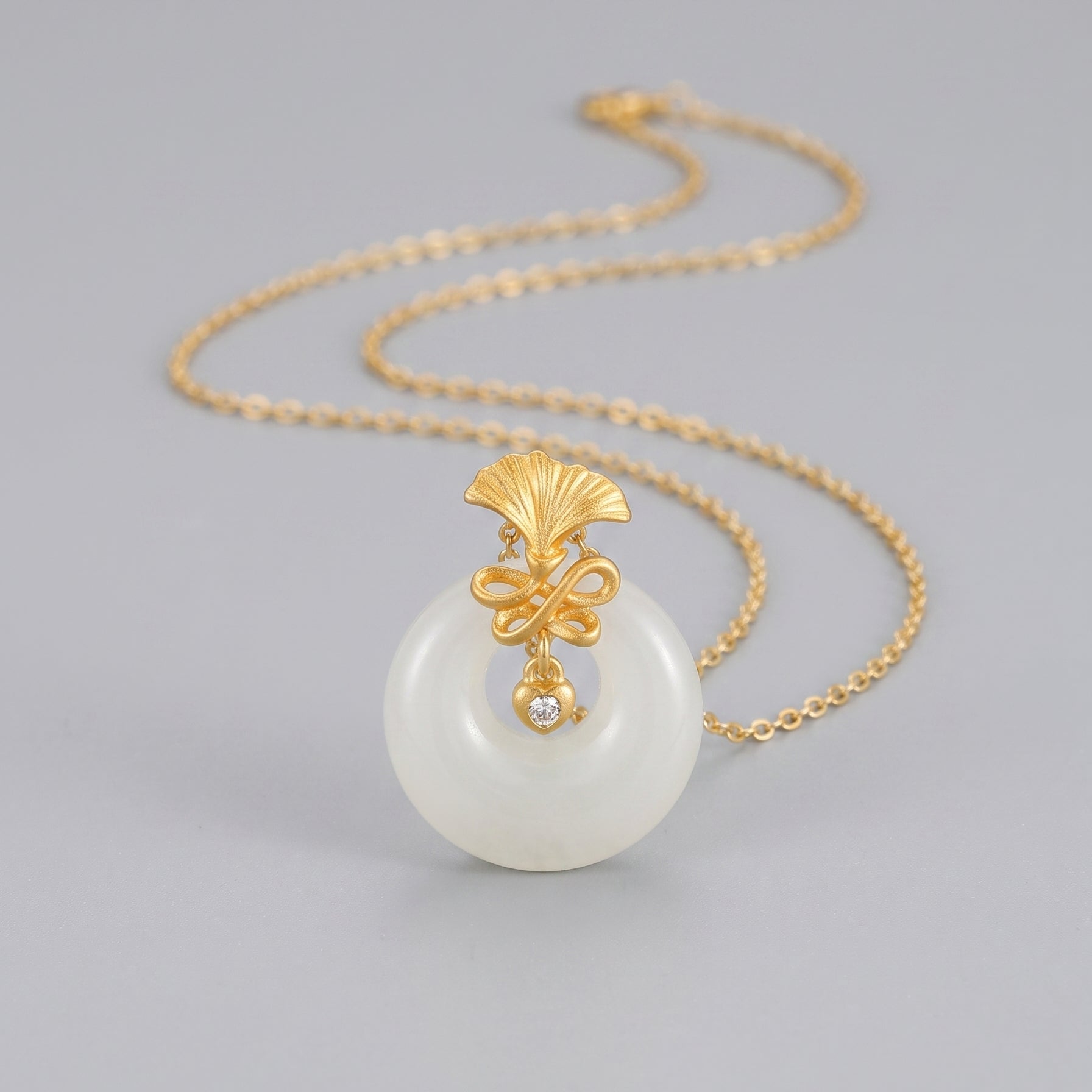 Charmed Life — Light Green Jade Donut Pendant Necklace