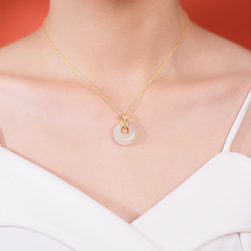 Charmed Life — Light Green Jade Donut Pendant Necklace