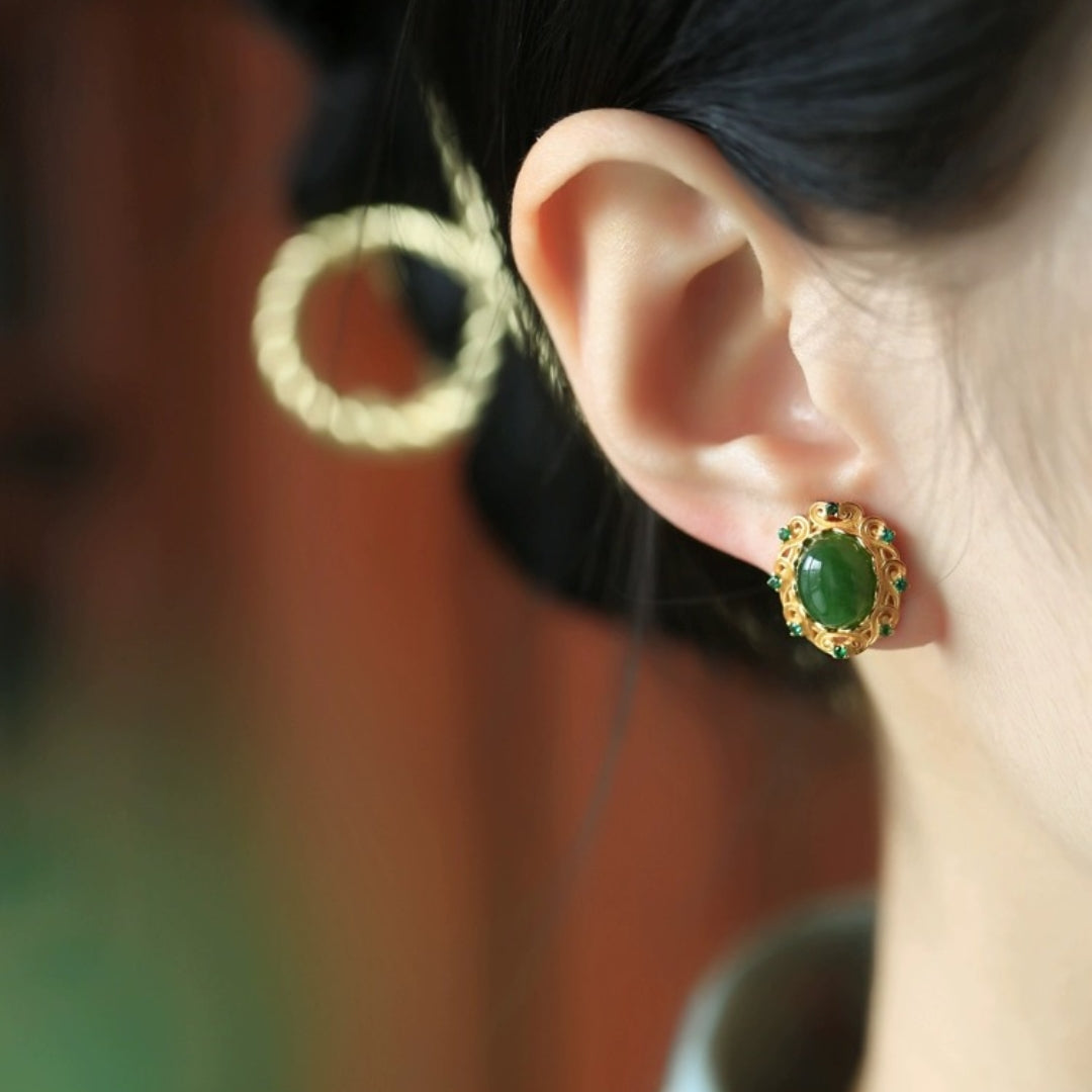 Charmed Green Jade Cloud Stud Earrings with gold-plated silver setting and small green stones around the edge