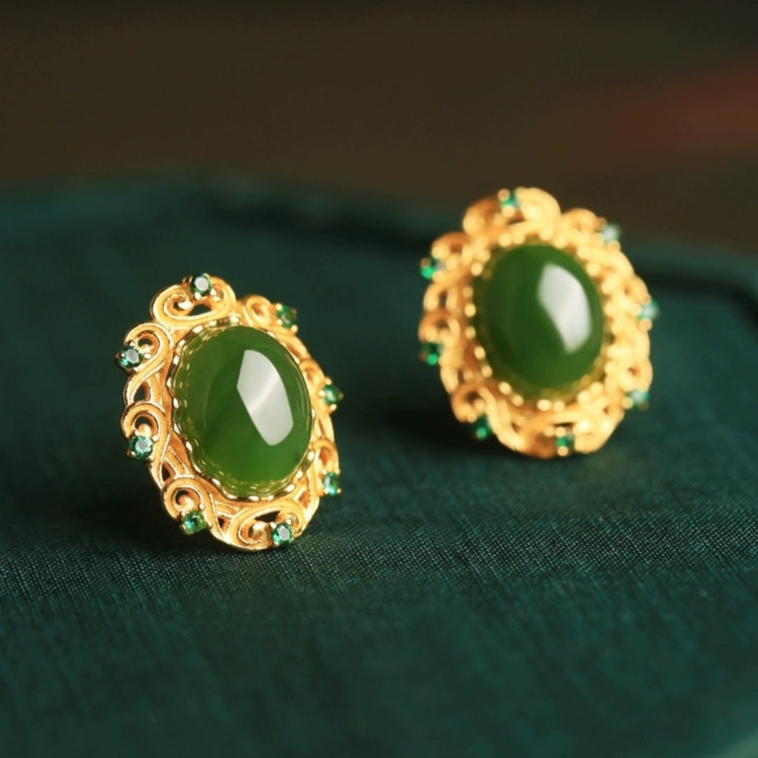 Charmed — Green Jade Cloud Stud Earrings with ornate gold-plated silver setting and small green accent stones.