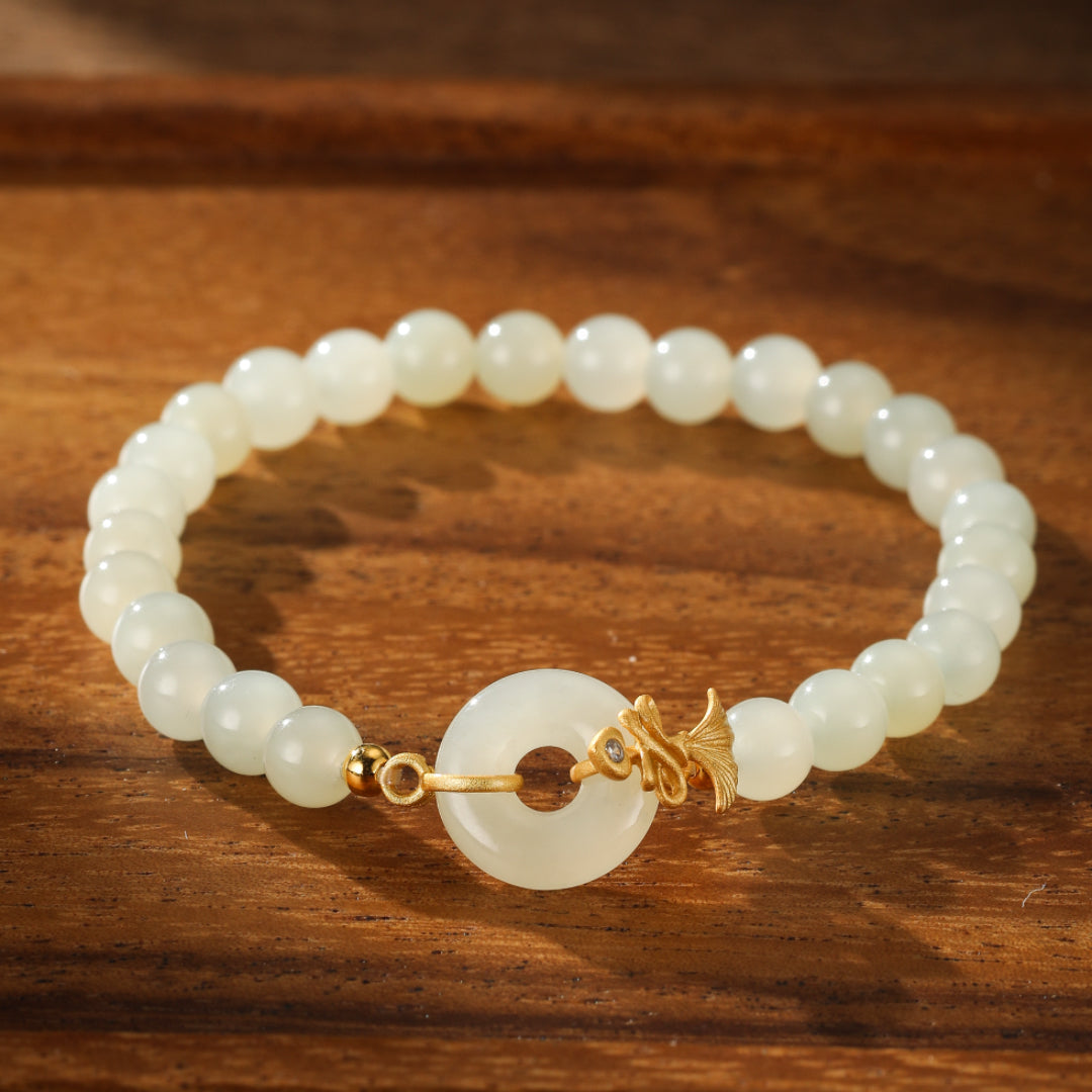 Charmed Life Hetian Jade Bi Disc Beaded Bracelet with gold fish charm and diamond accent