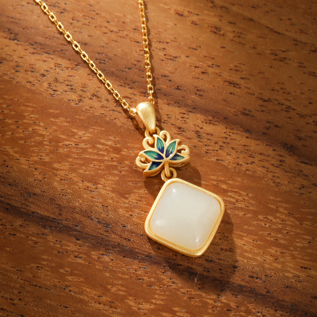 Ease Hetian Jade Lotus Pendant Necklace with blue enamel lotus detail on a gold-plated chain