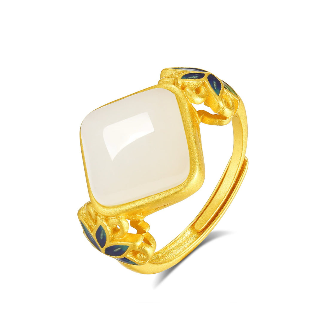 Ease Hetian Jade Lotus Ring featuring a square white jade stone set in gold-plated silver with blue lotus accents.