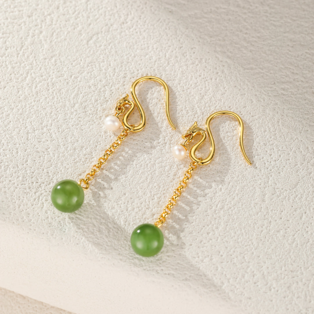 Holding Court green jade dragon drop earrings with pearl accents and gold chain