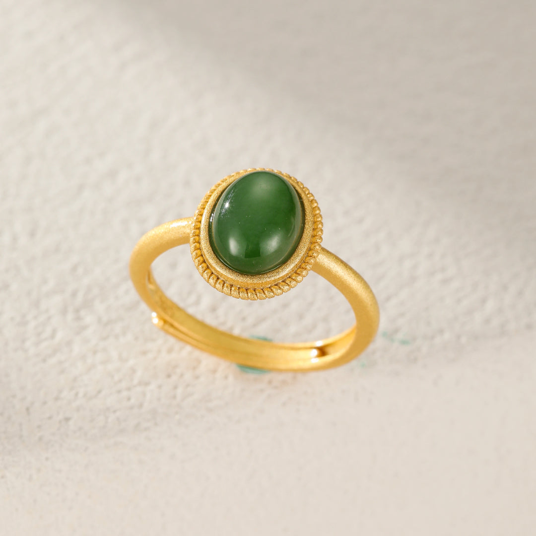 New Day green jade cabochon ring set in gold-plated silver with a rope bezel detail