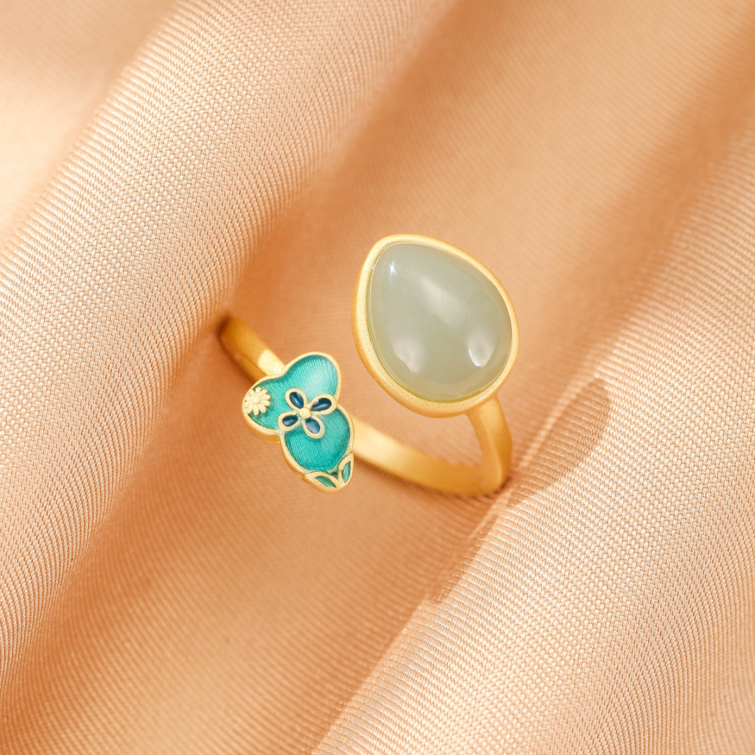 Twice Blessed Hetian Jade Gourd Jewelry Set, featuring a gold-plated silver ring with a teardrop-shaped light green jade stone and a turquoise gourd-shaped charm with floral details.